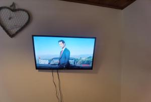 TV a/nebo společenská místnost v ubytování TravelMore