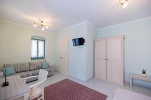TV a/nebo společenská místnost v ubytování 999 Luxury Hotel + 37 fotografií