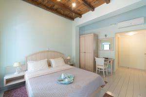 Postel nebo postele na pokoji v ubytování 999 Luxury Hotel
