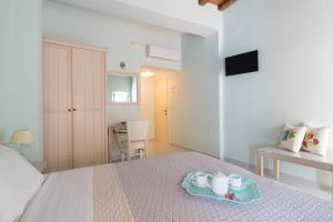 Postel nebo postele na pokoji v ubytování 999 Luxury Hotel