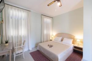 Postel nebo postele na pokoji v ubytování 999 Luxury Hotel