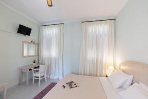 Postel nebo postele na pokoji v ubytování 999 Luxury Hotel