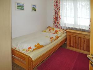 Posteľ alebo postele v izbe v ubytovaní Apartment Dobler by Interhome