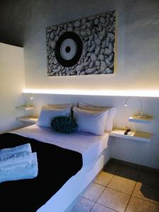 Posteľ alebo postele v izbe v ubytovaní Rigas Rooms