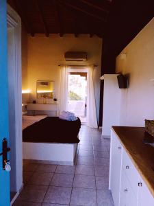Posteľ alebo postele v izbe v ubytovaní Rigas Rooms