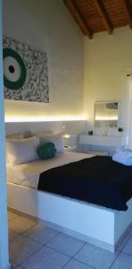 Posteľ alebo postele v izbe v ubytovaní Rigas Rooms