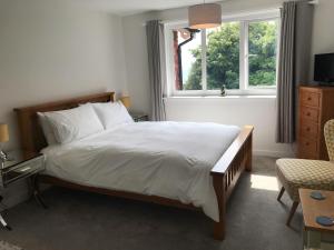 Cama ou camas em um quarto em Cornerways