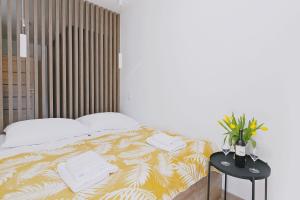 Krevet ili kreveti u jedinici u objektu Apartamenty Sun Seasons 24 - Grunwaldzka