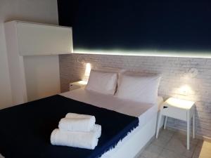 Posteľ alebo postele v izbe v ubytovaní Rigas Rooms