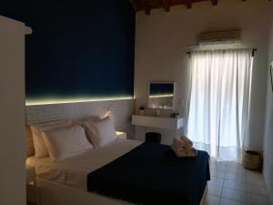 Posteľ alebo postele v izbe v ubytovaní Rigas Rooms