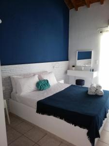 Posteľ alebo postele v izbe v ubytovaní Rigas Rooms