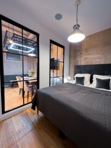 Katil atau katil-katil dalam bilik di MojeMiędzyzdroje LU 8A - Luksusowy apartament 100 metrów od morza