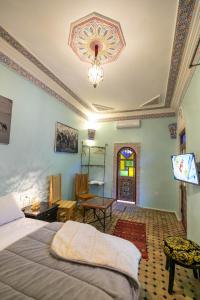 Postel nebo postele na pokoji v ubytování Riad Noha