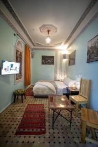 TV a/nebo společenská místnost v ubytování Riad Noha