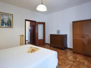 A bed or beds in a room at Apartment Charlie by Interhome