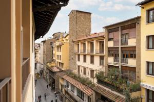 a view of a city street with buildings at Por Santa Maria Apartment in Florence