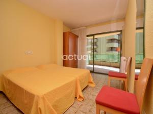 Ein Bett oder Betten in einem Zimmer der Unterkunft Super Beach 6H