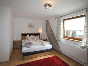 Posteľ alebo postele v izbe v ubytovaní Apartment Brettfall Blick by Interhome