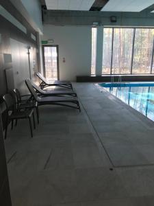 Bazén v ubytovaní AQUAMARINA ONYX GOLD alebo v jeho blízkosti