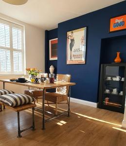 a dining room with a table and chairs at 37 Trinity Lane in Beverley