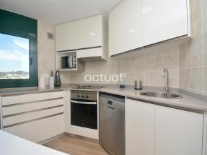 A kitchen or kitchenette at Super Beach 10H