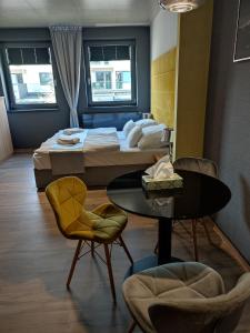 Posteľ alebo postele v izbe v ubytovaní OPÁL Residence Apartman