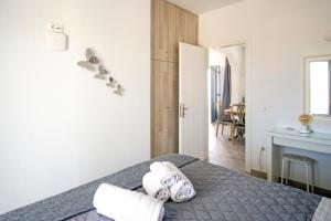Posteľ alebo postele v izbe v ubytovaní Villa Artemis (Agios Lazaros, Psarou)
