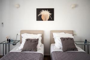 Posteľ alebo postele v izbe v ubytovaní Villa Artemis (Agios Lazaros, Psarou)