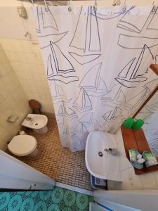Koupelna v ubytování Albergo Stella Di Mare + 37 fotografií