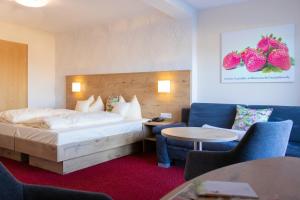 Postel nebo postele na pokoji v ubytování DEVA Hotel Renchtalblick