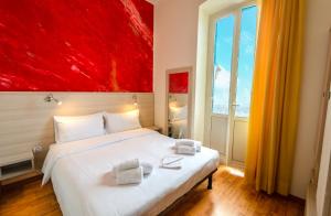 Postel nebo postele na pokoji v ubytování Hotel Villa La Brise