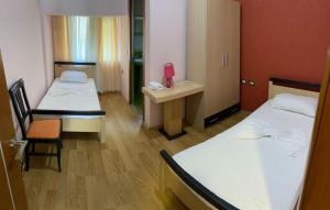 Uma cama ou camas num quarto em Kukësi Resort Aldo