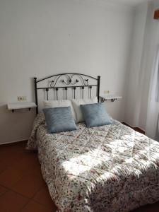 Casa Montaur Zahara de la Sierra 객실 침대