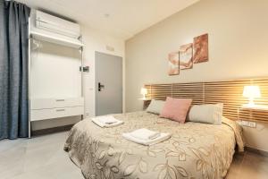 Posteľ alebo postele v izbe v ubytovaní Vincanto Rooms Old Town