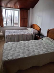 Posteľ alebo postele v izbe v ubytovaní Albergue Turístico Silleda