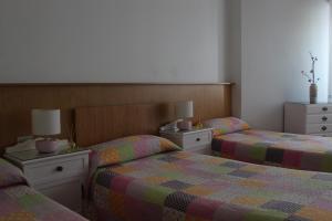 Posteľ alebo postele v izbe v ubytovaní Albergue Turístico Silleda