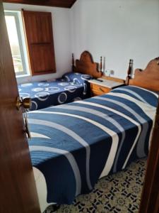Posteľ alebo postele v izbe v ubytovaní Albergue Turístico Silleda