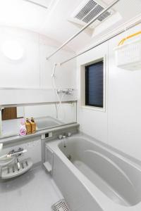 Ένα μπάνιο στο KYO SAKURA HOUSE +41 φωτογραφίες