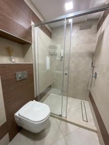 Koupelna v ubytování Nataly Homes + 34 fotografií