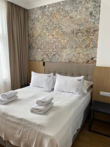 Lova arba lovos apgyvendinimo įstaigoje New Sobieski Apartments by OneApartments