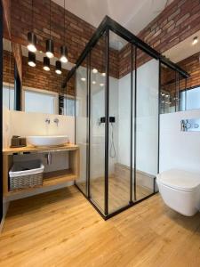 Vonios kambarys apgyvendinimo įstaigoje New Sobieski Apartments by OneApartments