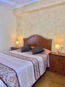 A bed or beds in a room at Apartamento La Herradura