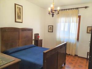Postel nebo postele na pokoji v ubytování Hotel Madonna di Luciago