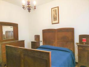 Postel nebo postele na pokoji v ubytování Hotel Madonna di Luciago
