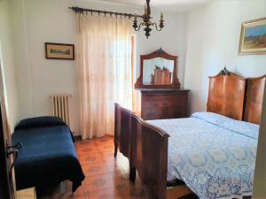 Postel nebo postele na pokoji v ubytování Hotel Madonna di Luciago
