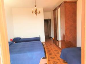 Postel nebo postele na pokoji v ubytování Hotel Madonna di Luciago