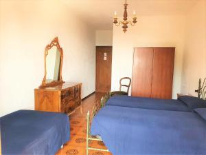 Postel nebo postele na pokoji v ubytování Hotel Madonna di Luciago