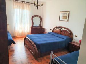 Postel nebo postele na pokoji v ubytování Hotel Madonna di Luciago
