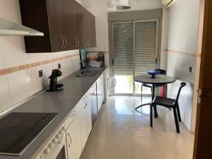 Virtuvė arba virtuvėlė apgyvendinimo įstaigoje Casona de flores ll