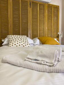 A bed or beds in a room at CASA VIRGINIA